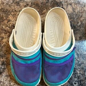 Crocs - size 10 women’s or 8 men’s. Cute with cute pockets and zippers